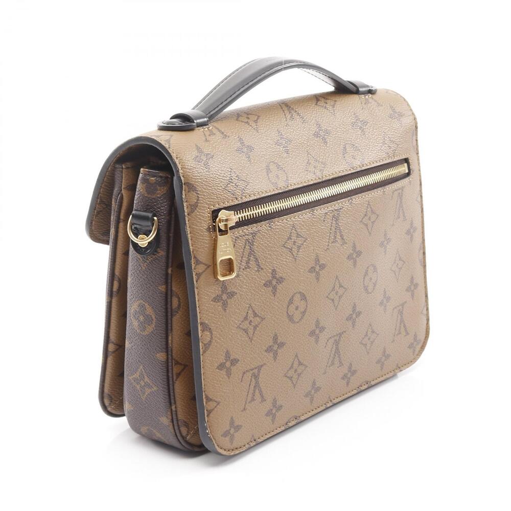 Louis Vuitton brown canvas Monogram Metis leather Reverse black Pochette